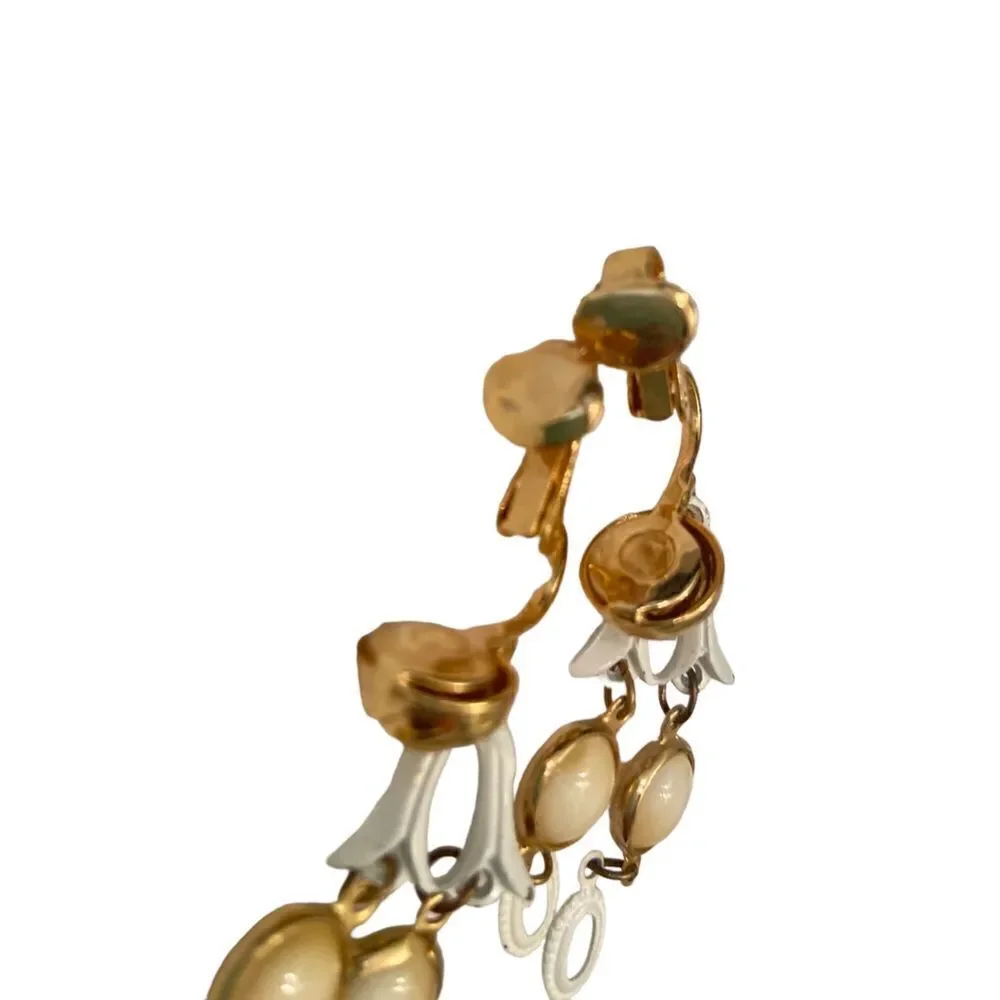 New Vintage 1990’s soft clip on drop earrings gold tone swirl & white enamel